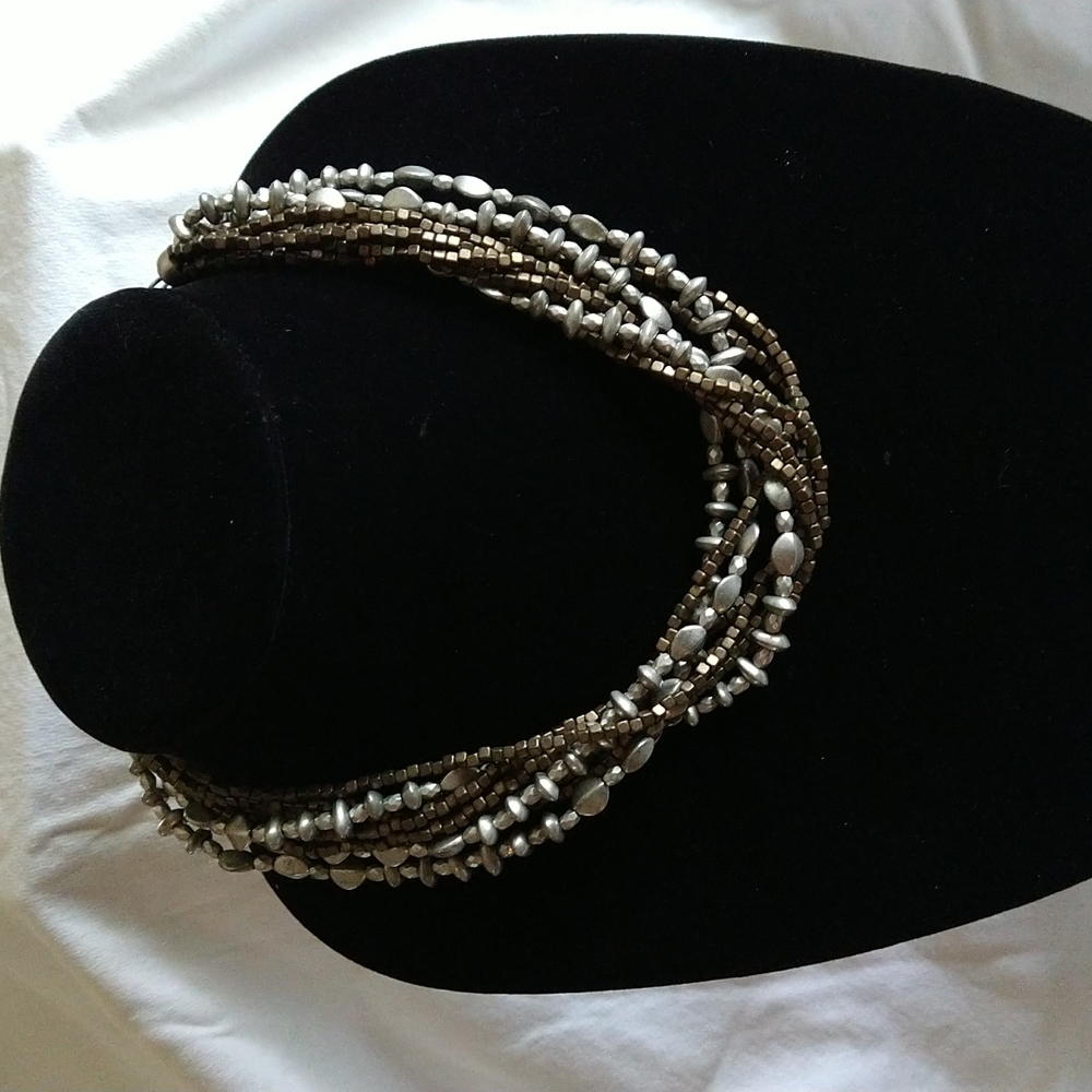 Premier multi strand necklace in copper and matte silver.